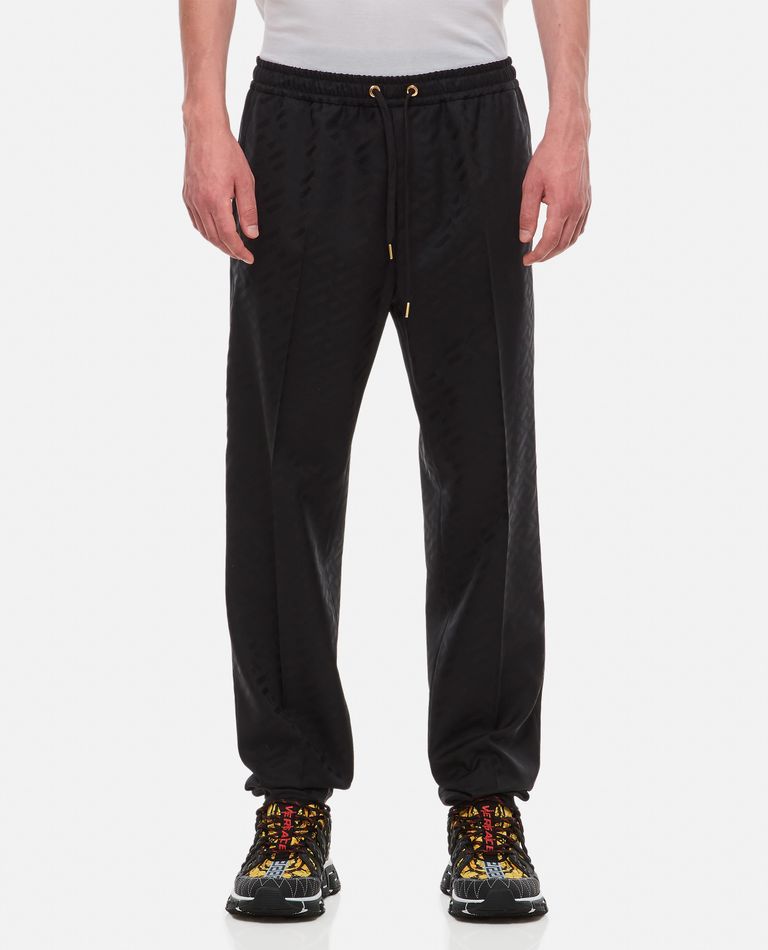 Shop Versace Drawstring Casual Pants In Black