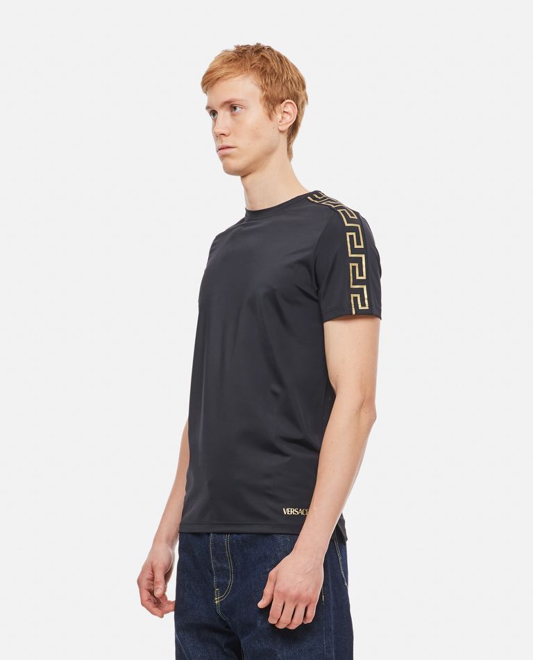 Tシャツ・カットソー Versace 1003711 1A02322 GRECA SPORTS T-shirt Versace Greca-trim T-shirt | Black | FARFETCH JO