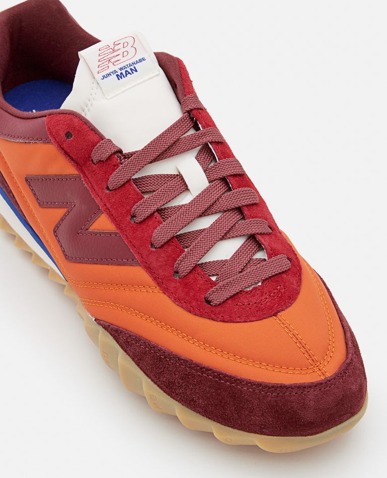 New balance 620 store herren orange