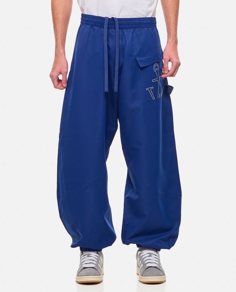 Shop Jw Anderson Twisted Joggers In Blue