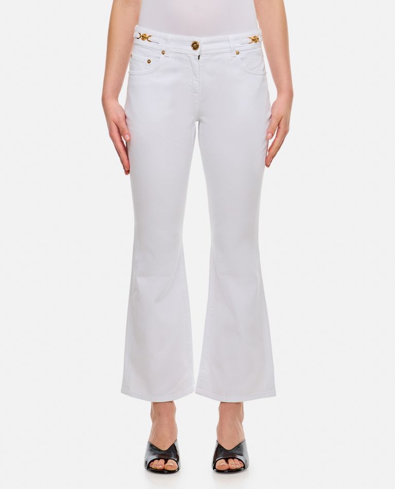Shop Versace Slim Denim Pants In White