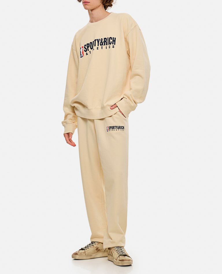 Shop Sporty And Rich Team Logo Sweatpants In White