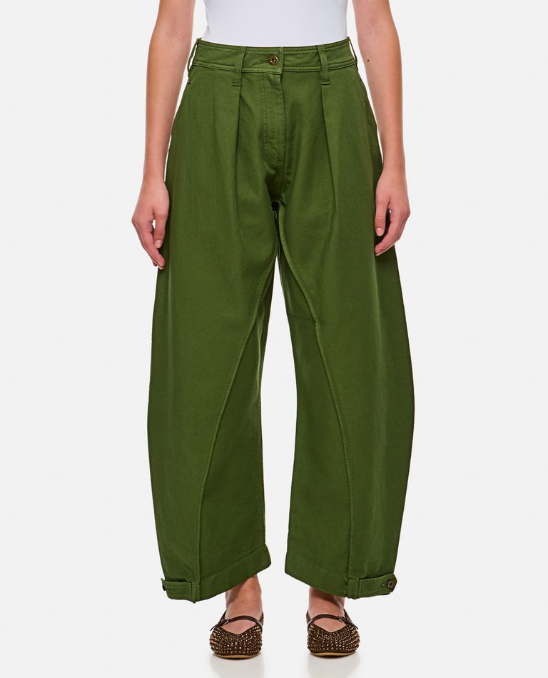 Shop Jw Anderson Twisted Seam Trousers In Green